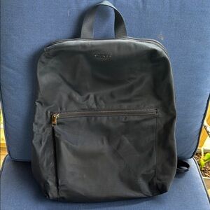 Tumi Black Backpack with Minimalist Design and Durable Material